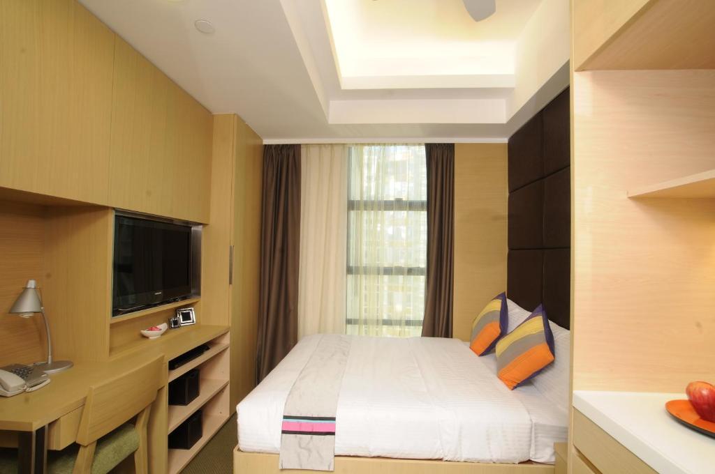 Causeway Corner Aparthotel Hong Kong Habitación foto